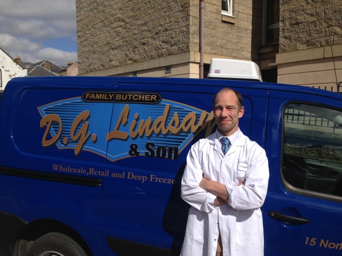Beaton Lindsay in front of blue D.G Lindsay Butcher Van